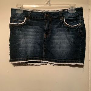 Denim mini skirt trimmed with alittle embroidery